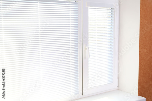 White window with blinds