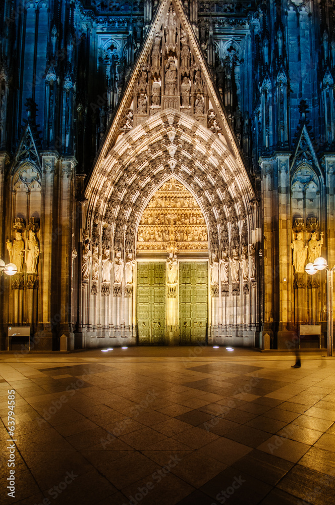 Cologne door entrance cathedral facade at night