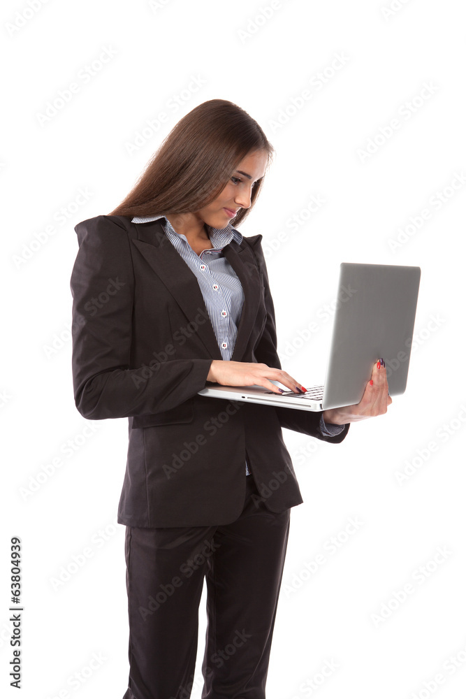 Business woman with laptop standing isolated on white Business woman with laptop standing isolated on white