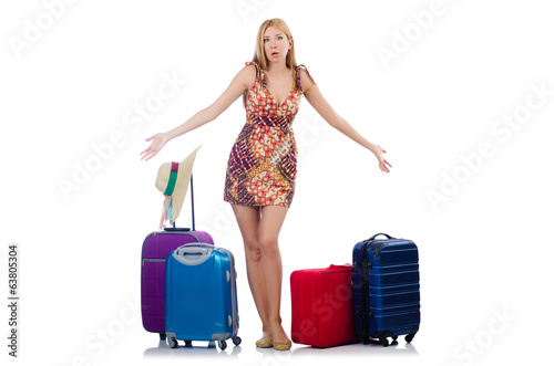 Woman preparing for vacation with suitcase isolated on white