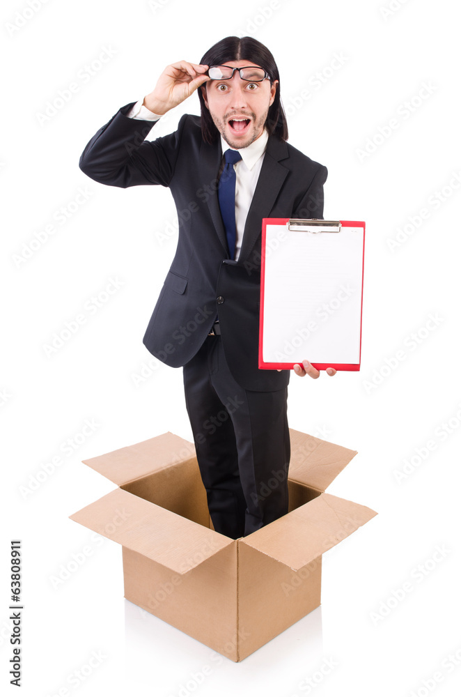 Young businessman in thinking out of box concept Young businessman in thinking out of box concept