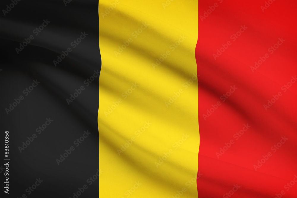 Naklejka premium Seria potarganych flag. Belgia.