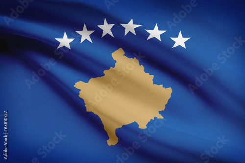 Series of ruffled flags. Republic of Kosovo. photo