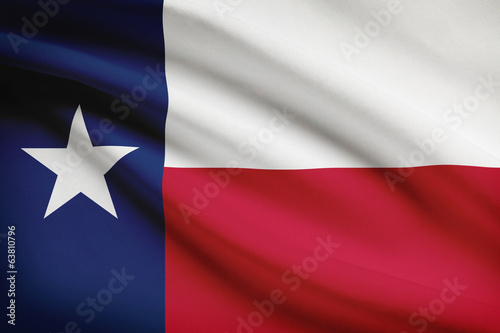 Series of ruffled flags. State of Texas.