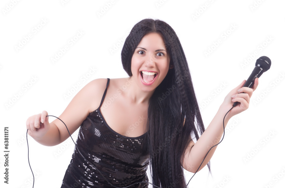 Young female singer with mic on white Young female singer with mic on white