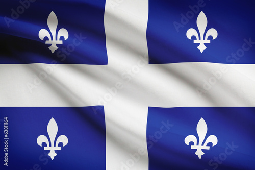 Series of ruffled flags. Quebec.