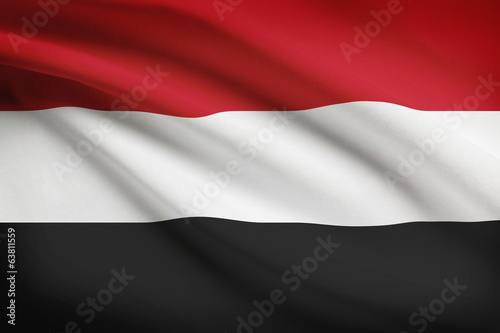 Series of ruffled flags. Republic of Yemen.