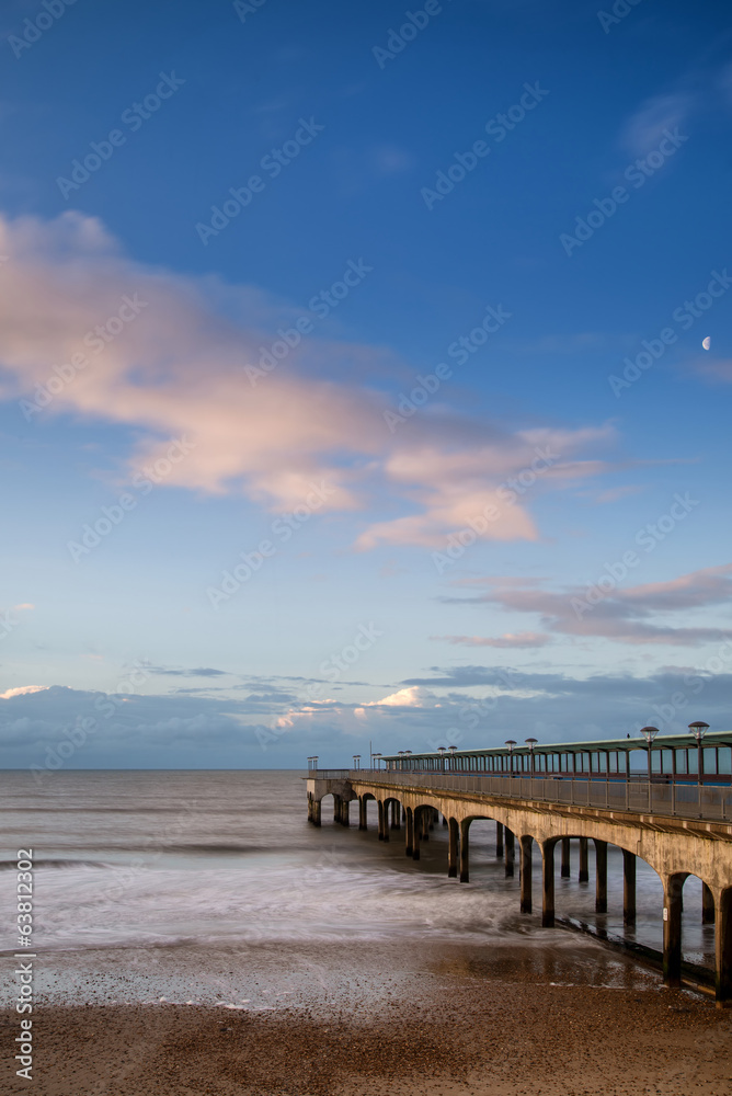 Dawn landscape of pier stretching out into sea