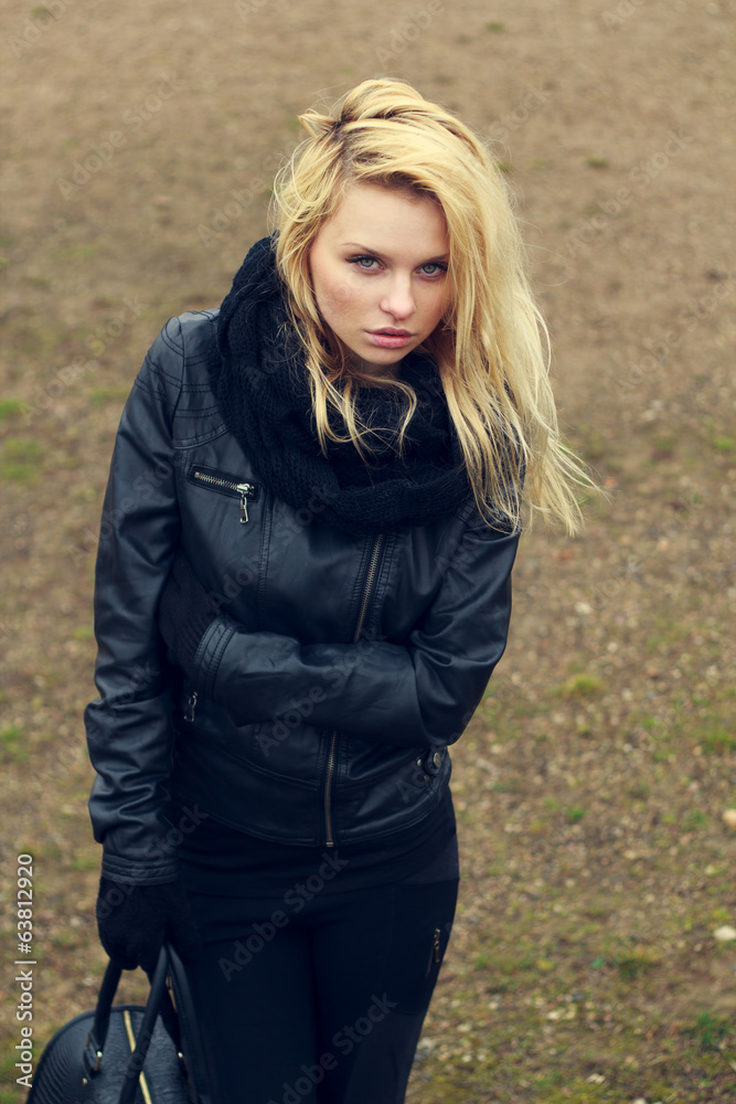 Beautiful girl with a bag in hand portrait Beautiful girl with a bag in hand portrait
