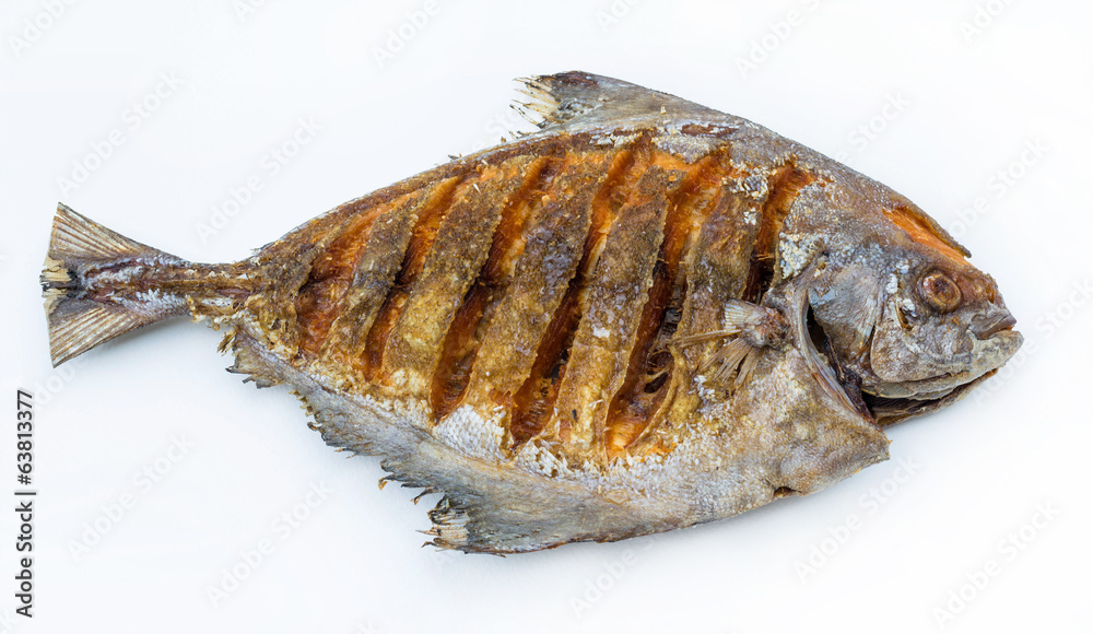 Asian style deep fried pomfret in white isolated background Asian style deep fried pomfret in white isolated background