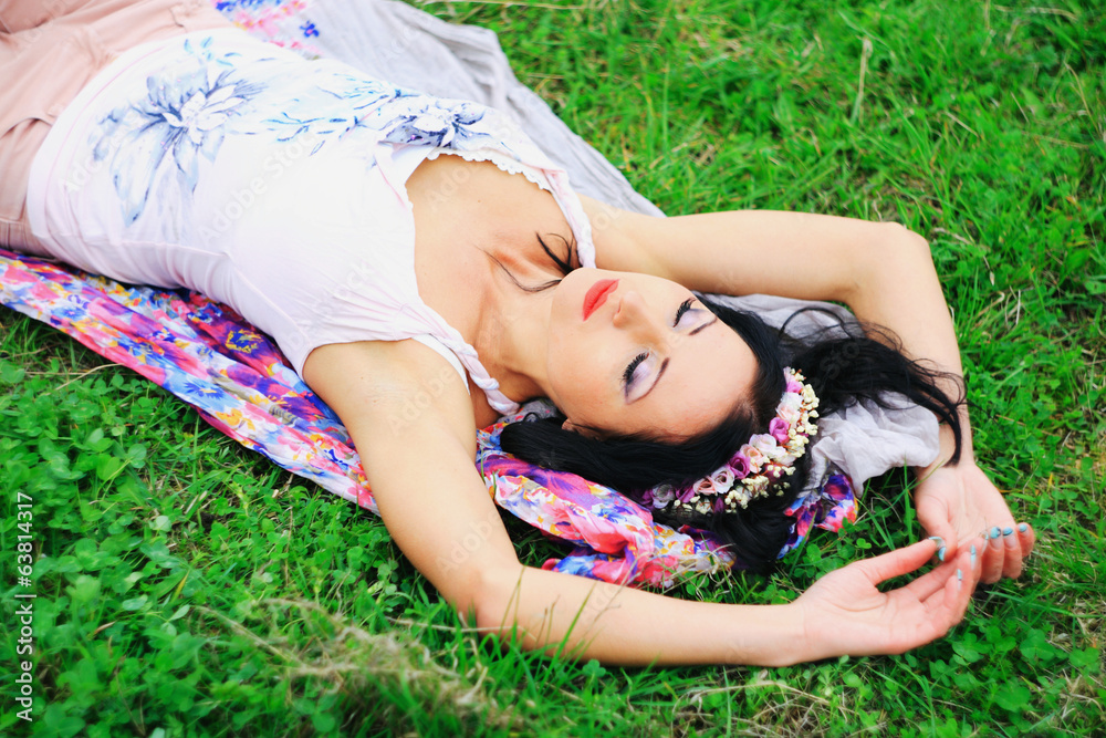 young girl lay on the grass young girl lay on the grass