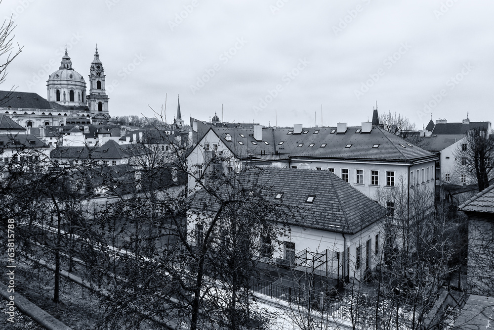 Roofs of old Prague. Stylized film. Large grains. Toning.