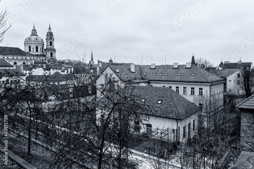 Roofs of old Prague. Stylized film. Large grains. Toning.