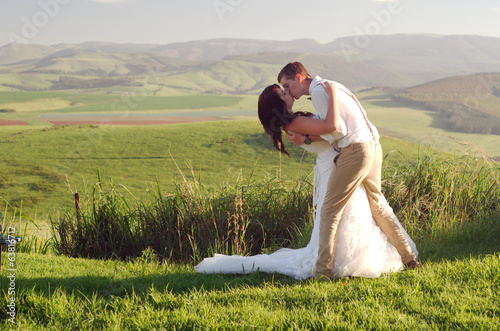 African bride and groom landscape