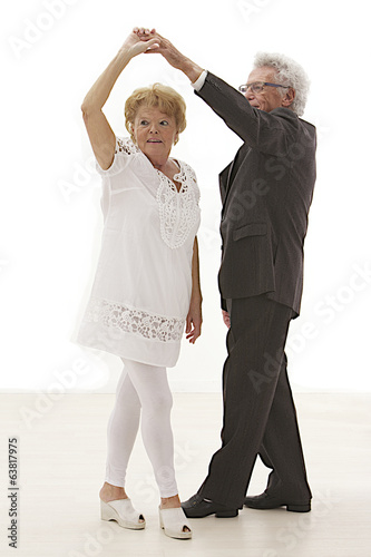 Senior couple dancing rock & roll photo