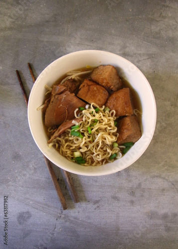 Chinese style noodle served with duck and tofu
