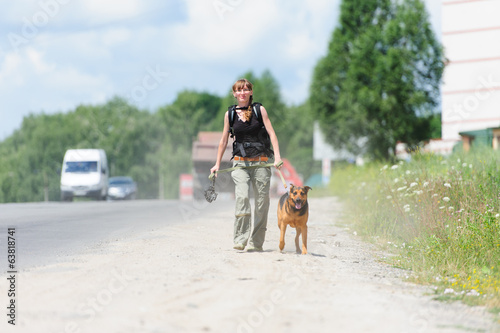 girl running with dog