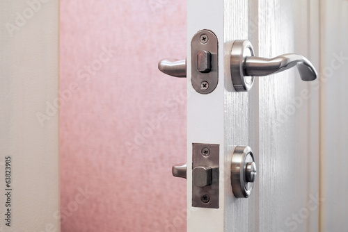 Safety or security lock on an open toilet's door