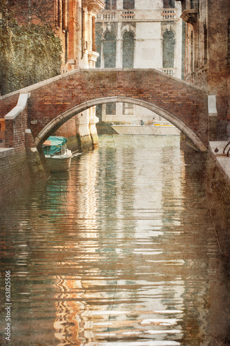 Retro style picture of a typical Venice canal view