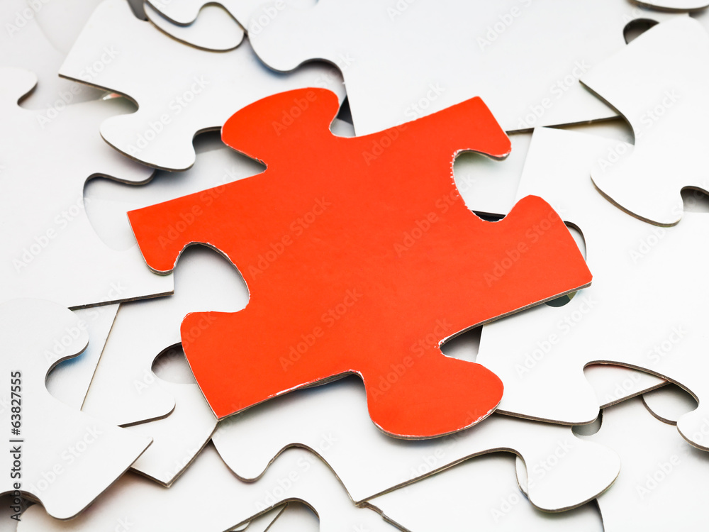 separate red piece on pile of white jigsaw puzzles separate red piece on pile of white jigsaw puzzles