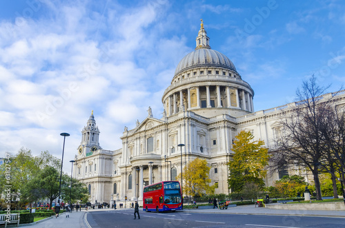 St. Paul's Cathedral and red double-deckers, London, UK photo