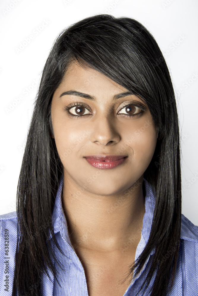 Closeup Indian Woman smiling in work clothes Closeup Indian Woman smiling in work clothes