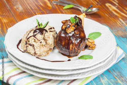 Poached Pear with Chocolate Sauce and ice cream