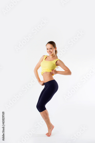 Sport fitness woman young healthy girl smiling girl doing exerci