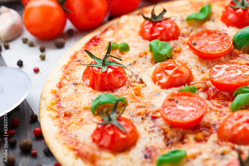 Vegetarian pizza with cherry tomatoes