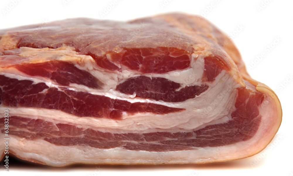 piece of meat smoked bacon isolated white background. piece of meat smoked bacon isolated white background.