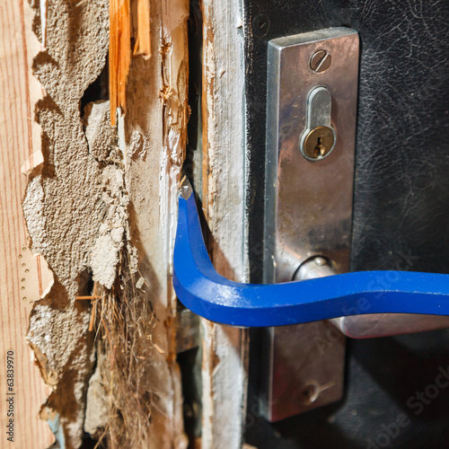 Hack the door with a crowbar