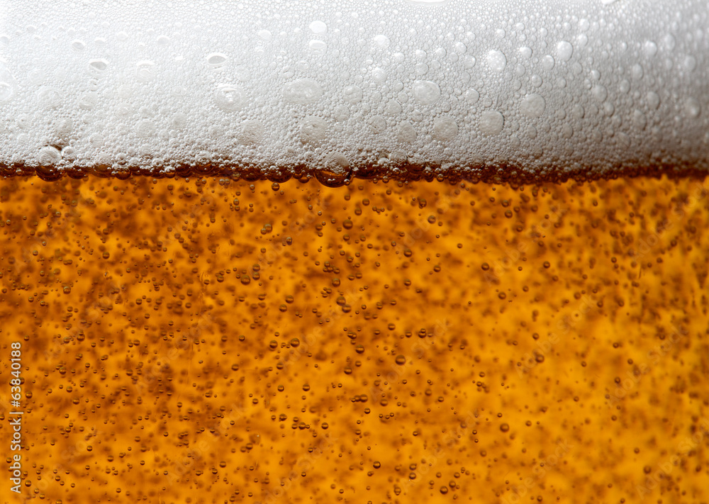 Beer bubbles in the high magnification and close-up.