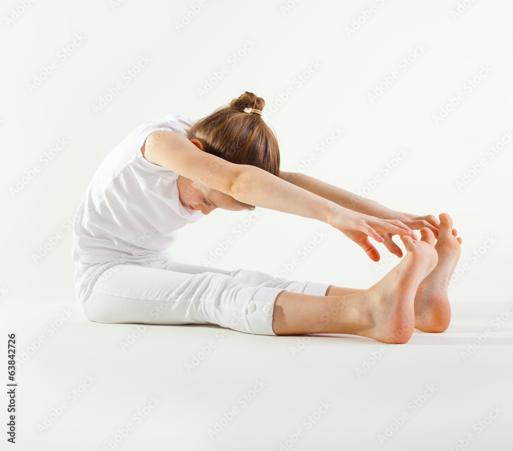 Young girl doing yoga