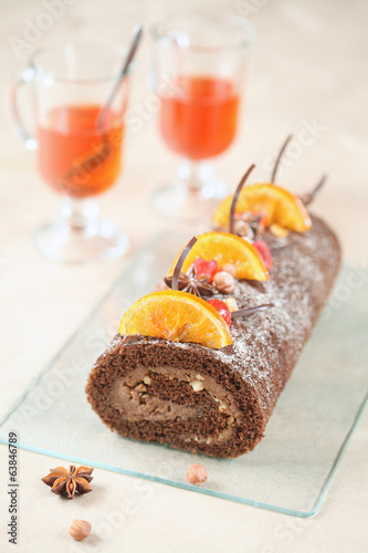 Chocolate Swiss Roll Cake with candied orange slices