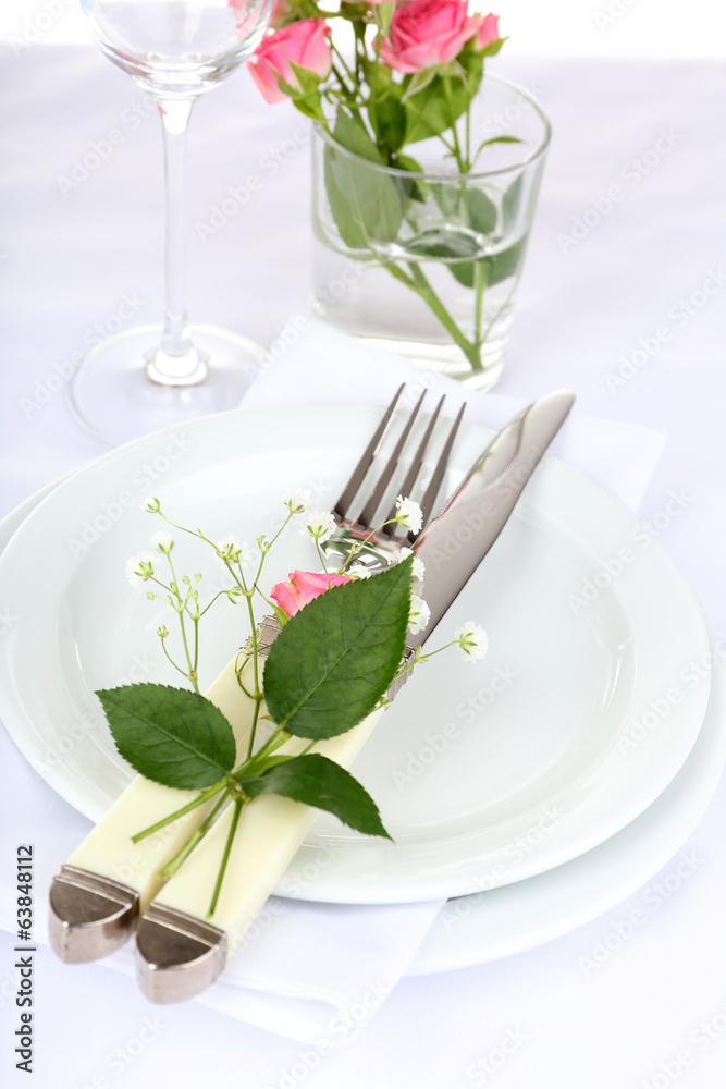 Table setting with spring flowers close up Table setting with spring flowers close up