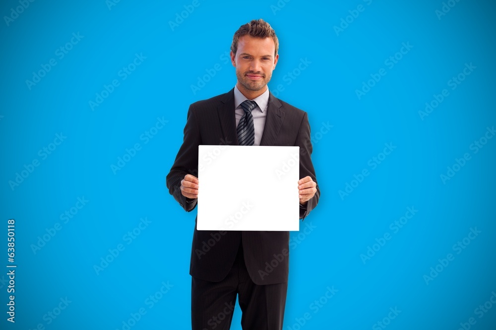 Composite image of businessman showing card Composite image of businessman showing card