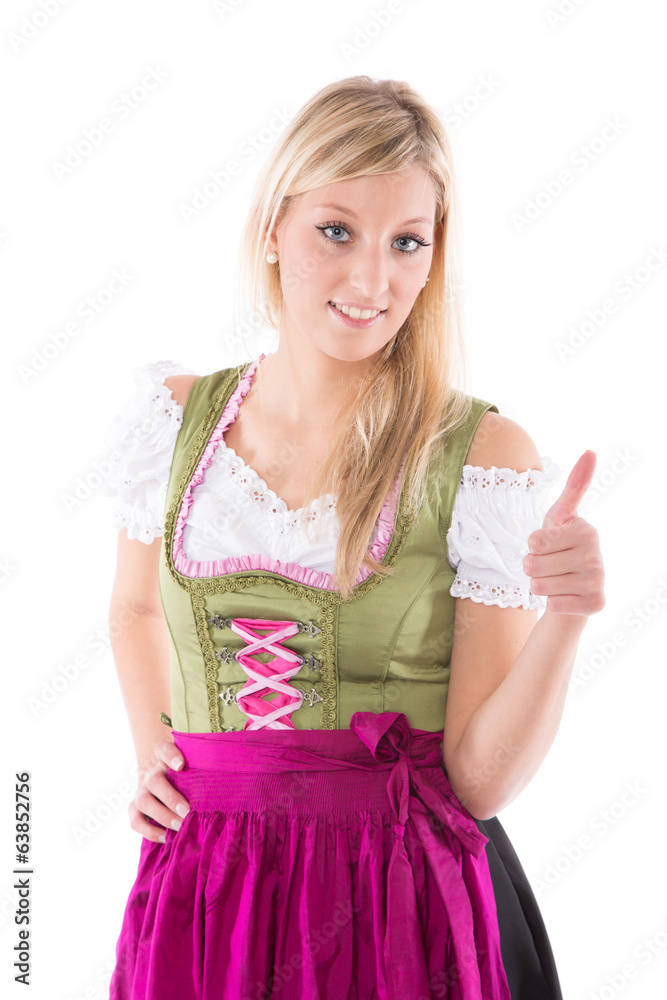 Frau im Dirndl zeigt Daumen hoch Frau im Dirndl zeigt Daumen hoch