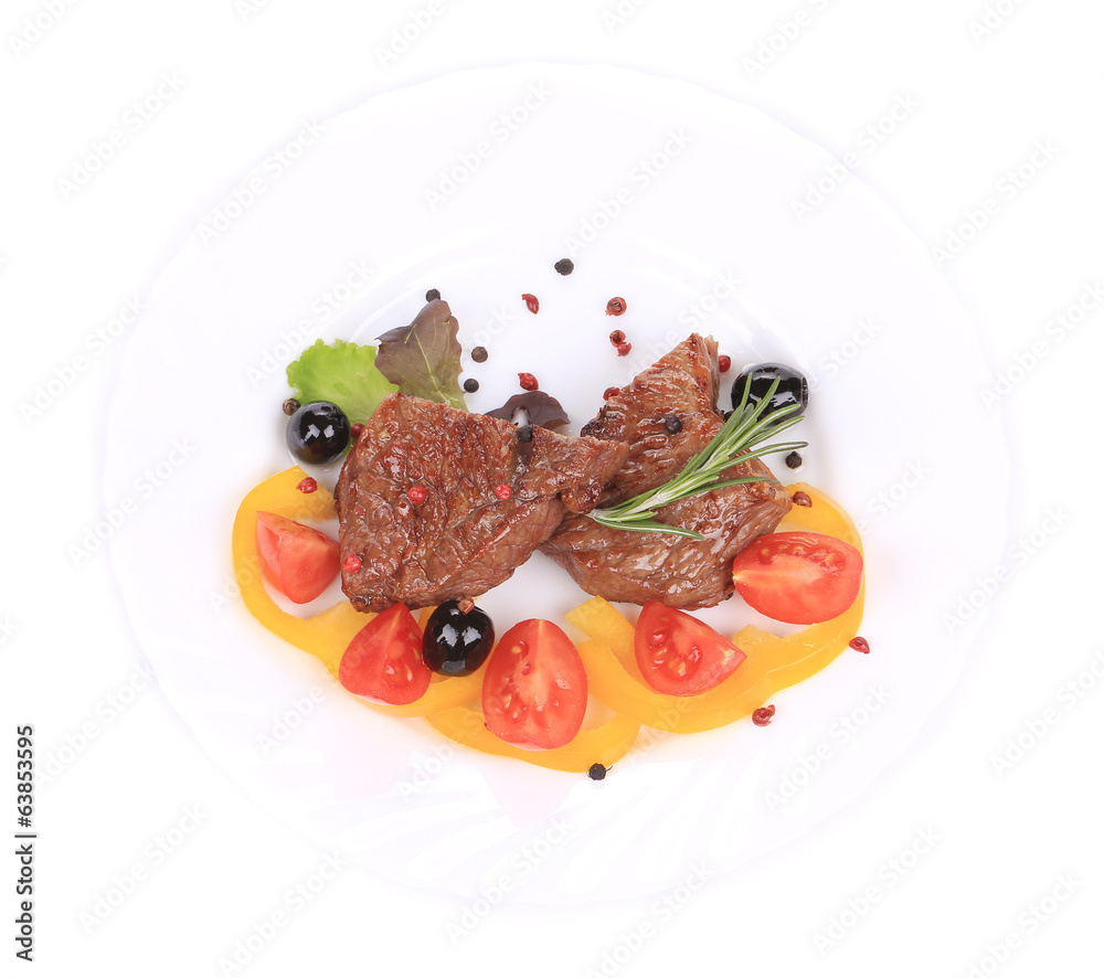 Beef steaks with rosemary and tomatoes. Beef steaks with rosemary and tomatoes.