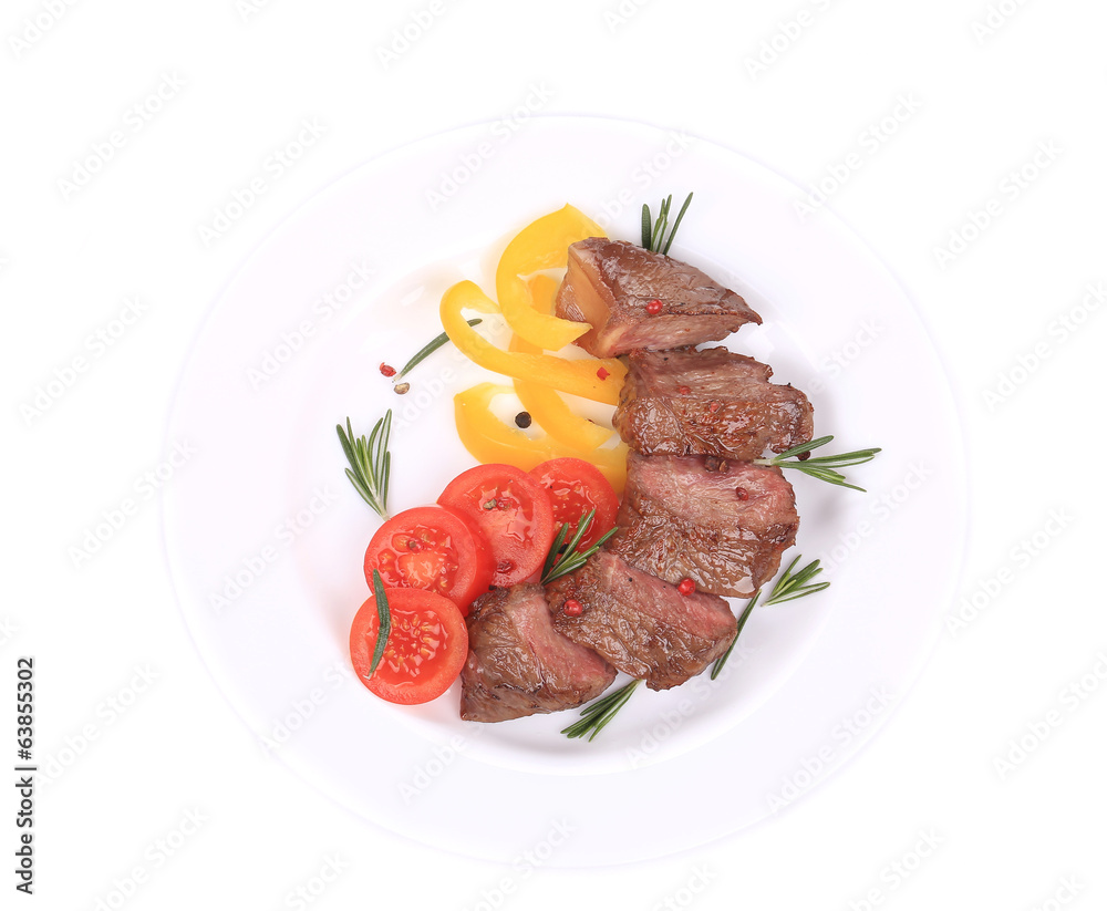 Beefsteaks with tomatoes and rosemary. Beefsteaks with tomatoes and rosemary.