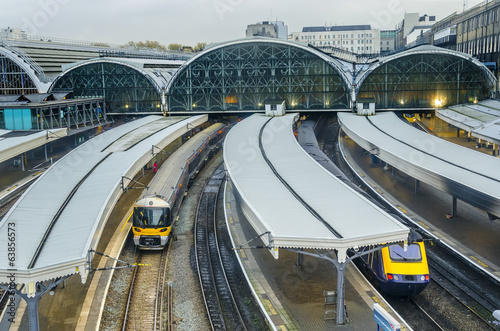 Train leaves Paddington railway station in London, UK