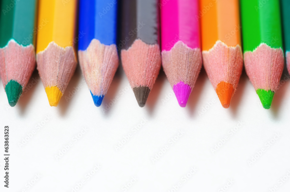Group of color pencils on light background
