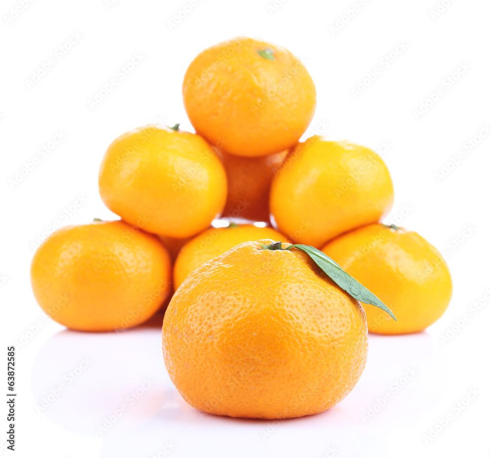 Ripe sweet tangerines, isolated on white Ripe sweet tangerines, isolated on white