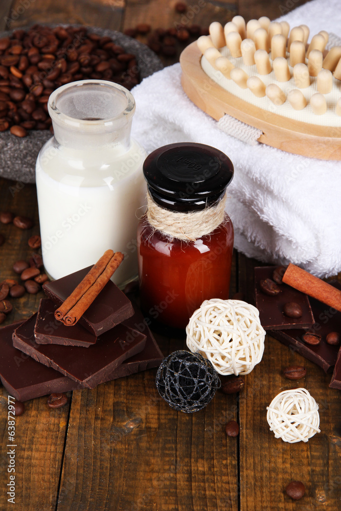 Beautiful chocolate spa setting on wooden table close-up Beautiful chocolate spa setting on wooden table close-up