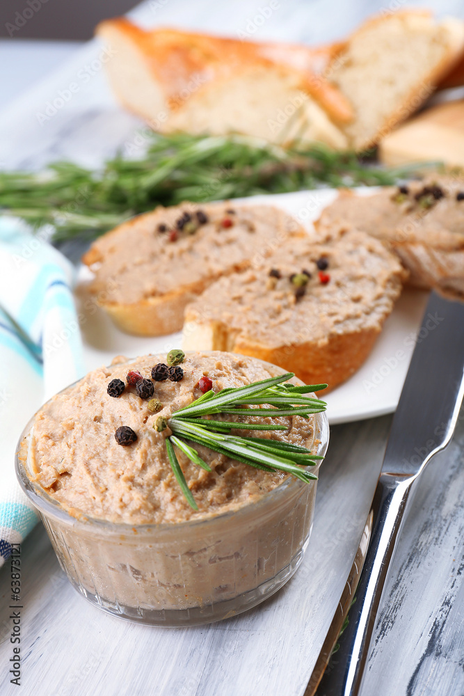 Fresh pate with bread on wooden table Fresh pate with bread on wooden table
