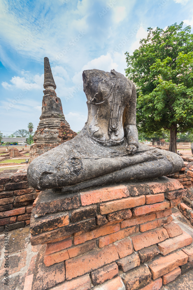 Broken Buddha statue at Ayuttaya, Thailand Broken Buddha statue at Ayuttaya, Thailand