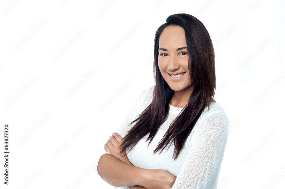Confident smiling young woman posing