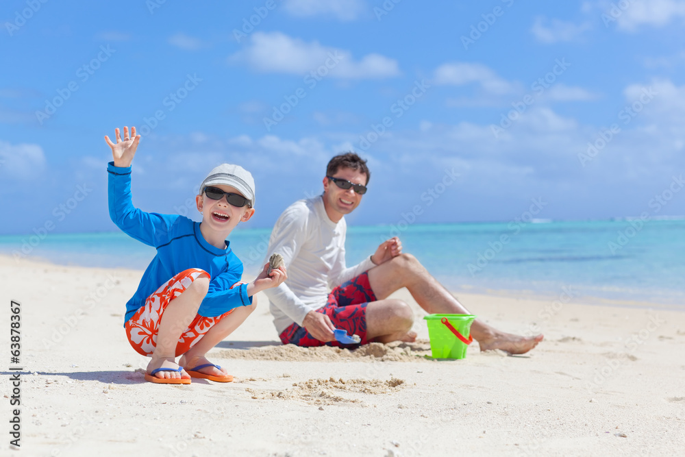 Fototapeta premium family building sand castle