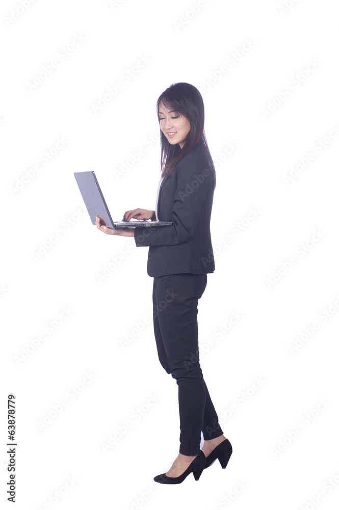Business woman and laptop - isolated over a white background Business woman and laptop - isolated over a white background
