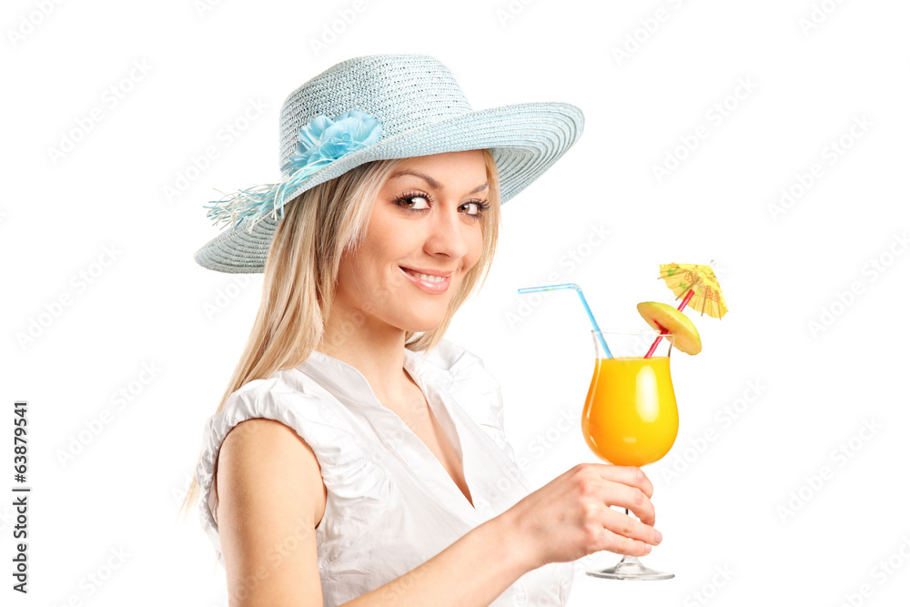 Blond woman holding an exotic cocktail Blond woman holding an exotic cocktail