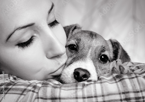 beautiful girl with dreadlocks and dog puppy Jack Russell terrie